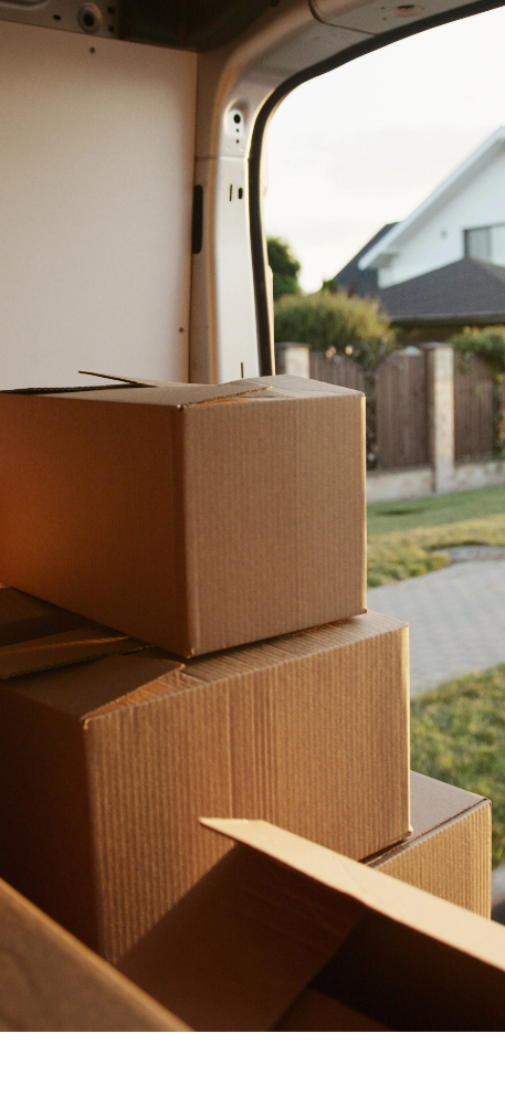 boxes stacked on top of each other in the back of a moving van